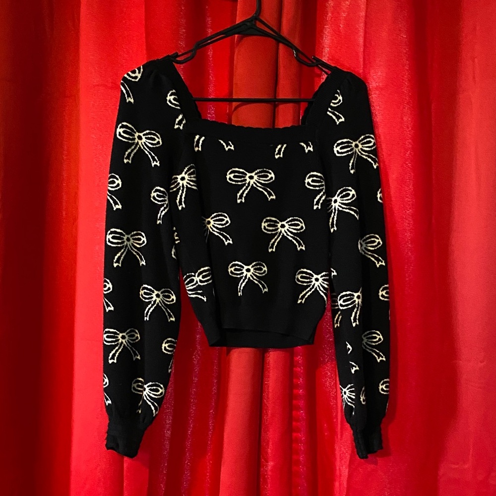 Black Sweater with White Bow Pattern